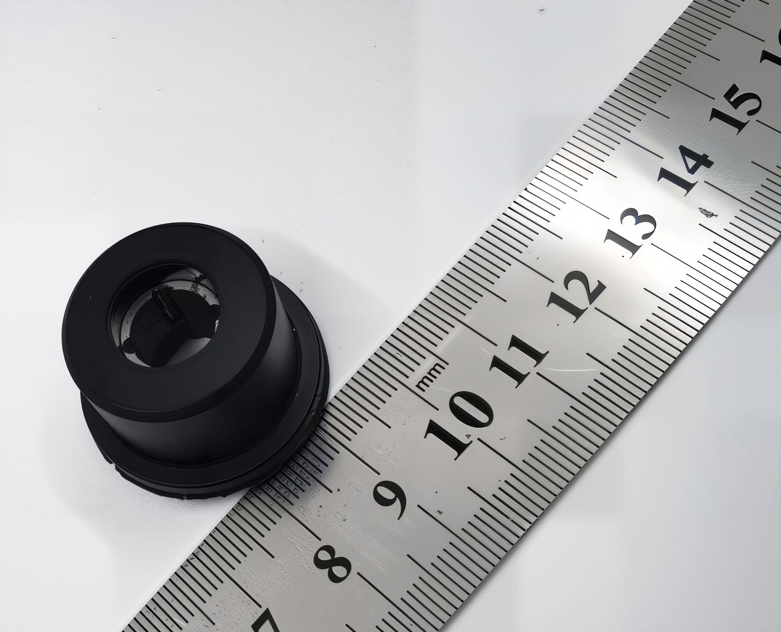 Small JyFan potted motor shown with scale reference for IP68 configuration